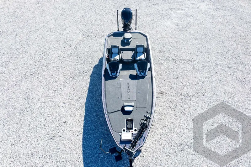 Slide: The Image of 2026 Vexus VXs21 boat on gravel, aerial view showcasing deck layout and seating. - 55
