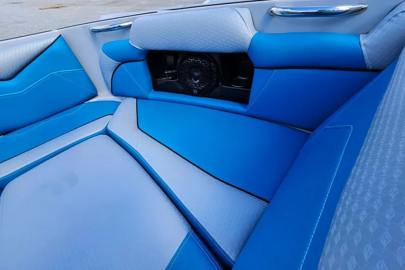 Slide: The Image of Blue and gray interior seating of 2022 Supreme S220 boat. - 10