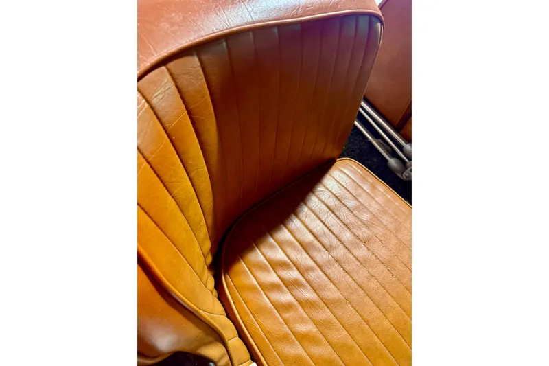 Slide: The Image of Vintage 1971 Glastron/Carlson GT 15 boat seat with orange leather upholstery. - 13