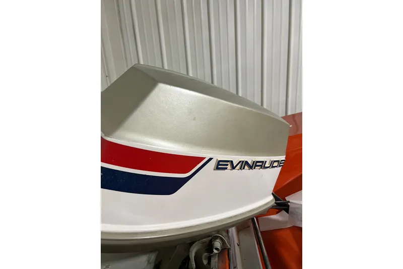 Slide: The Image of 1971 Glastron/Carlson GT 15 with Evinrude outboard motor, featuring red and blue accents. - 4