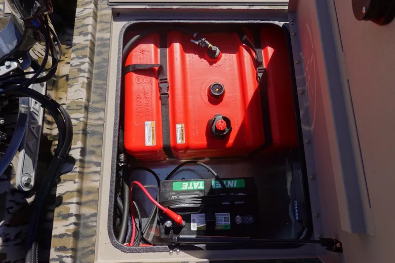 Slide: The Image of Battery and fuel tank compartment of 2026 Avid 18 Commander boat. - 27