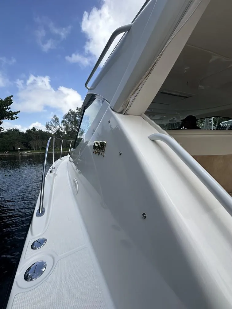 Slide: The Image of 2008 Tiara Yachts 3500 Sovran, sleek design, docked on a sunny day. - 31