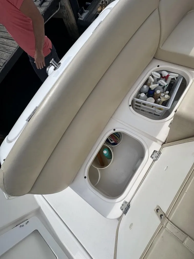 Slide: The Image of 2008 Tiara Yachts 3500 Sovran with open storage compartments on deck. - 49
