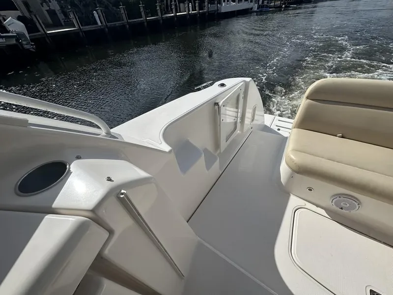 Slide: The Image of 2008 Tiara Yachts 3500 Sovran deck with seating, overlooking water. - 6