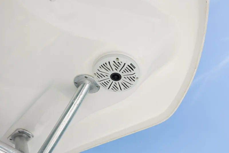 Slide: The Image of 2019 Sea Fox 220 Viper boat speaker and support pole against blue sky. - 21