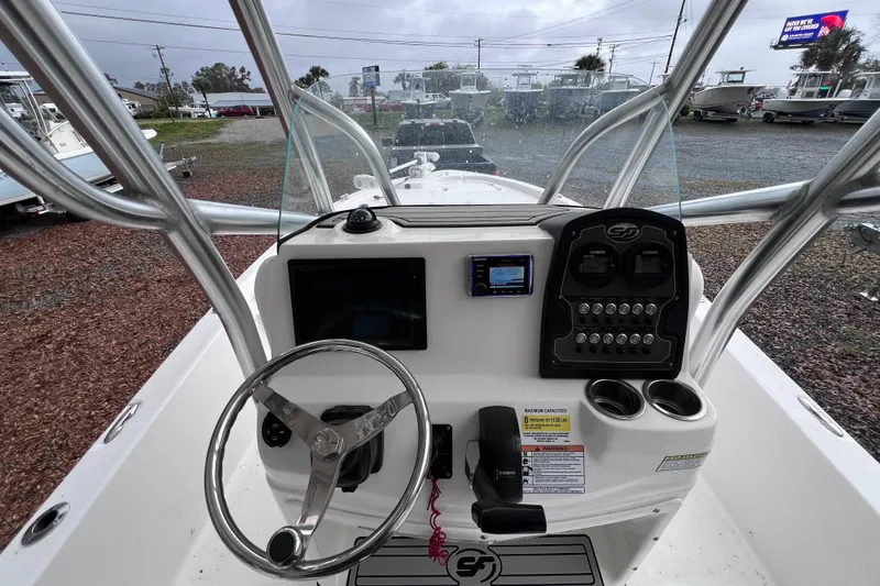 Slide: The Image of 2019 Sea Fox 220 Viper boat dashboard with steering wheel and control panel. - 3