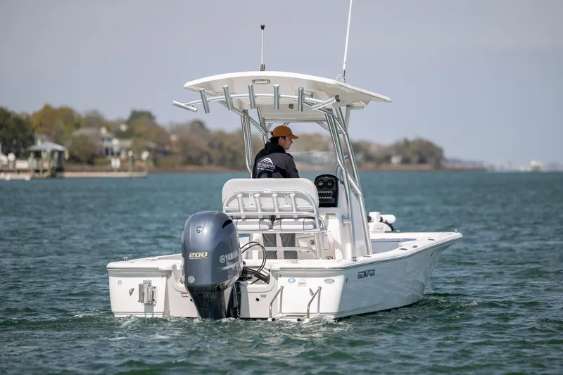 Slide: The Image of 2019 Sea Fox 220 Viper boat cruising on a calm lake with Yamaha engine. - 7