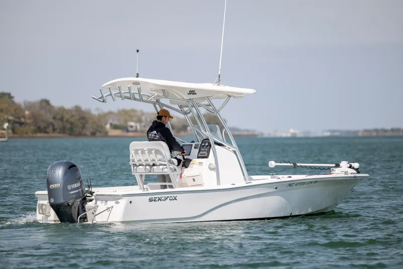 Slide: The Image of 2019 Sea Fox 220 Viper boat cruising on calm waters with Yamaha engine. - 8