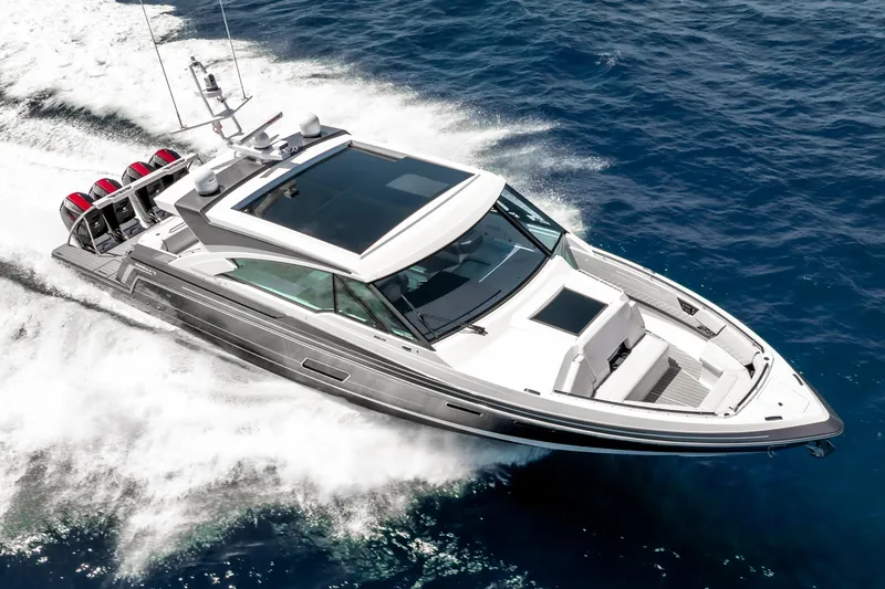 Slide: The Image of 2022 Formula 500 Super Sport Crossover cruising on open water, showcasing sleek design and powerful engines. - 15