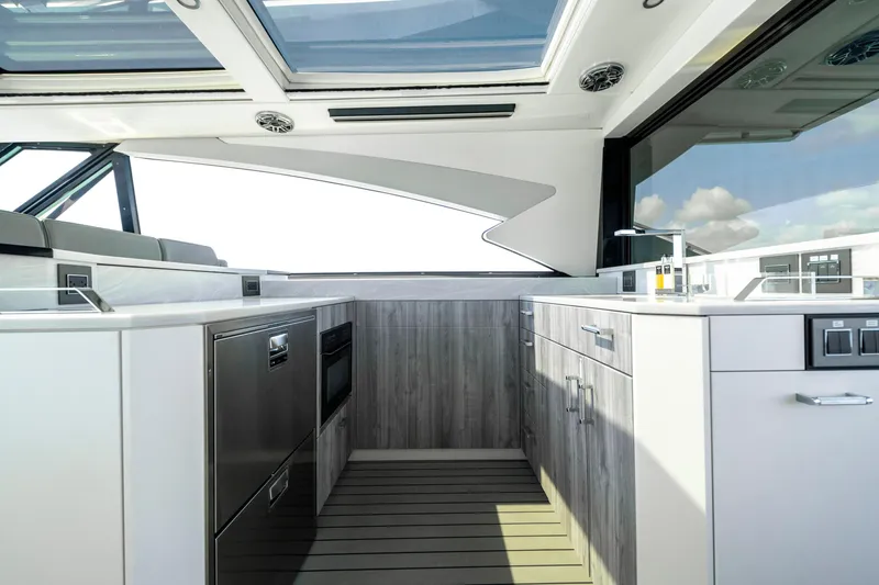 Slide: The Image of Luxurious interior of 2022 Formula 500 Super Sport Crossover yacht kitchen. - 21