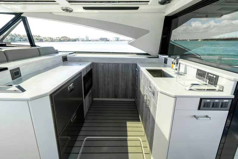 Slide: The Image of Luxurious interior of 2022 Formula 500 Super Sport Crossover yacht with modern kitchen amenities. - 22