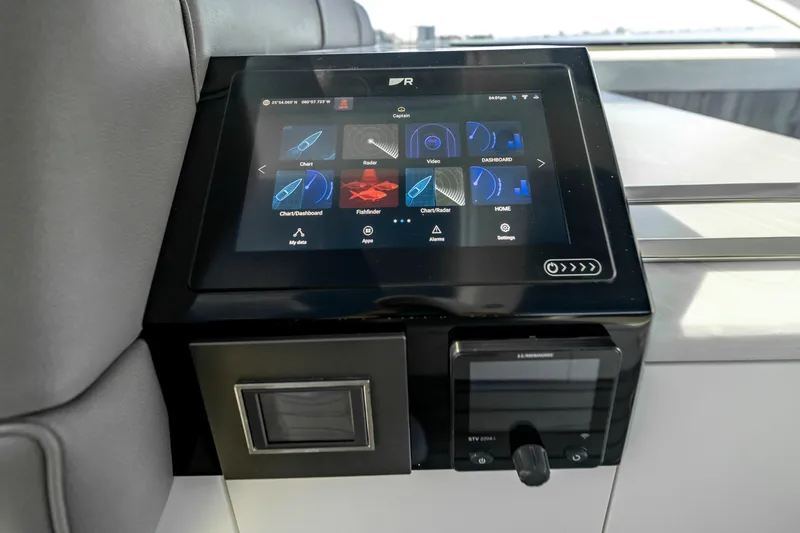 Slide: The Image of Touchscreen control panel in 2022 Formula 500 Super Sport Crossover boat cockpit. - 30