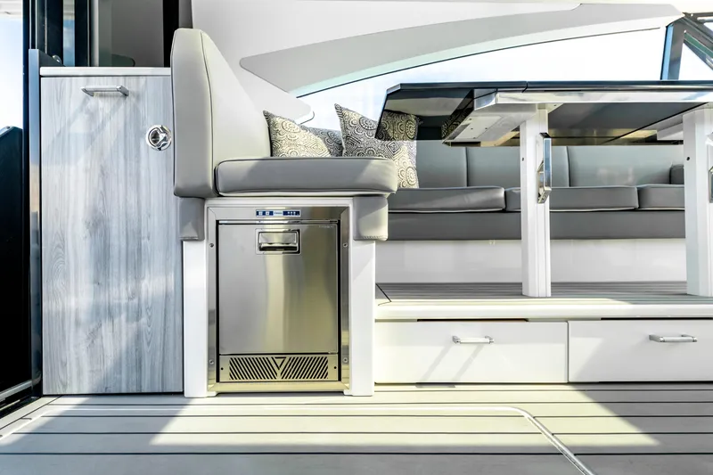 Slide: The Image of Luxurious interior of 2022 Formula 500 Super Sport Crossover yacht with modern seating and table. - 31