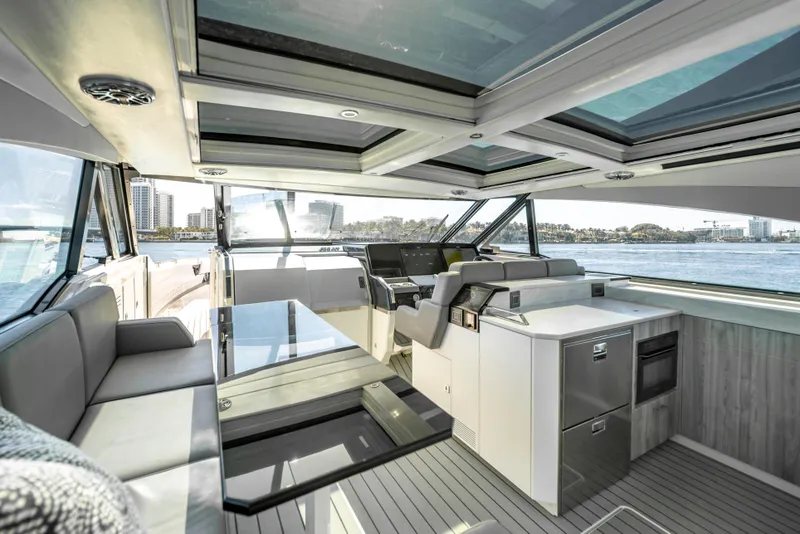 Slide: The Image of Interior of 2022 Formula 500 Super Sport Crossover yacht with modern design and waterfront view. - 36