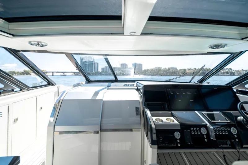 Slide: The Image of Interior view of 2022 Formula 500 Super Sport Crossover yacht cockpit with city skyline. - 39