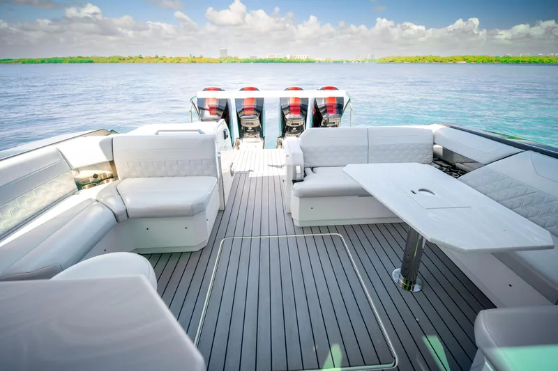 Slide: The Image of Luxurious 2022 Formula 500 Super Sport Crossover boat interior with spacious seating and table. - 40