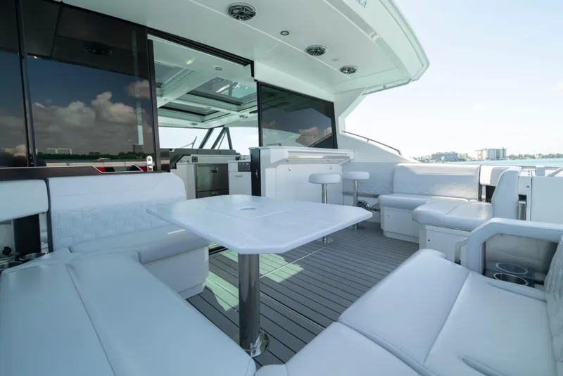 Slide: The Image of Luxurious 2022 Formula 500 Super Sport Crossover yacht interior with sleek seating and modern amenities. - 43