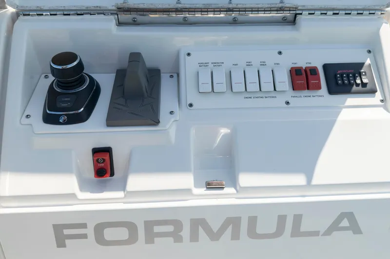 Slide: The Image of Control panel of 2022 Formula 500 Super Sport Crossover boat with joystick and switches. - 50
