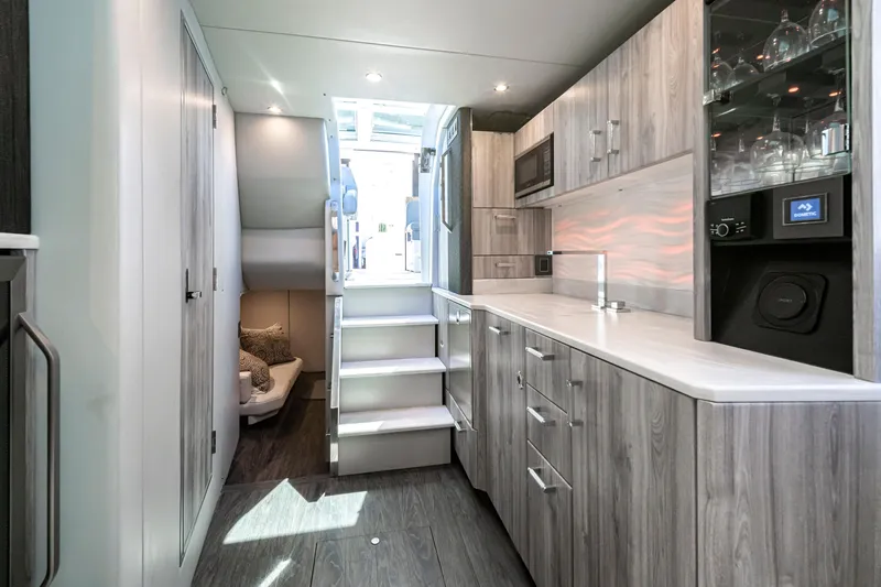 Slide: The Image of Interior of 2022 Formula 500 Super Sport Crossover with modern kitchen and seating area. - 51