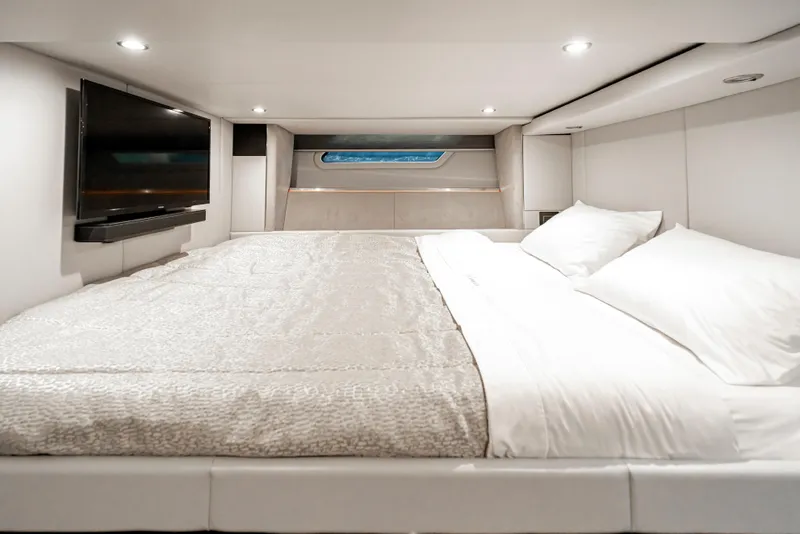 Slide: The Image of Luxurious cabin interior of 2022 Formula 500 Super Sport Crossover with bed and TV. - 60