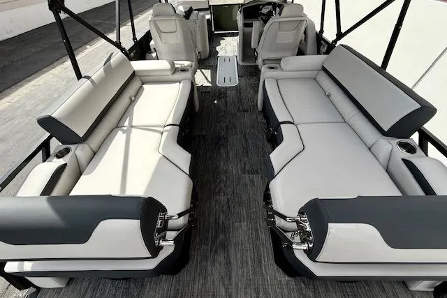 Slide: The Image of 2026 Avalon LSZ Quad Lounge Shift boat interior with luxurious seating and modern design. - 12