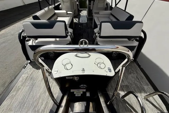 Slide: The Image of 2026 Avalon LSZ Quad Lounge Shift boat interior with sleek seating and modern design. - 16