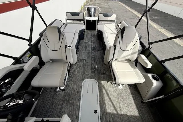 Slide: The Image of 2026 Avalon LSZ Quad Lounge Shift boat interior with luxurious seating and modern design. - 20
