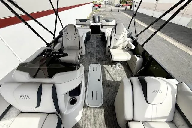 Slide: The Image of Luxurious 2026 Avalon LSZ Quad Lounge Shift boat interior with plush seating and modern design. - 21