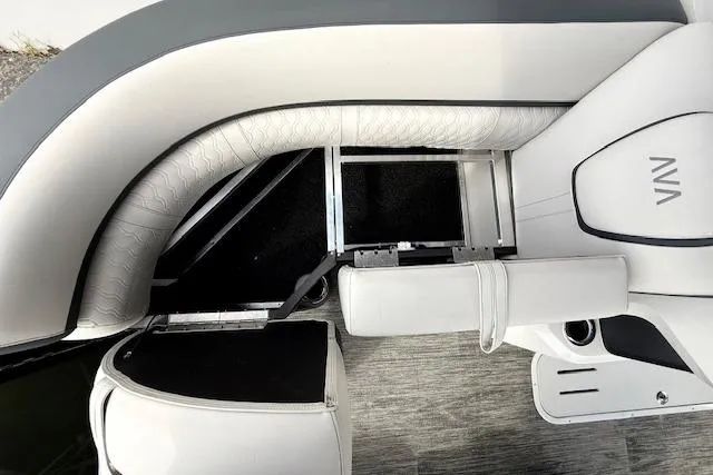 Slide: The Image of 2026 Avalon LSZ Quad Lounge Shift boat interior with modern seating and sleek design. - 26