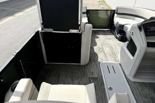 Slide: The Image of 2026 Avalon LSZ Quad Lounge Shift boat interior with modern seating and sleek design. - 3