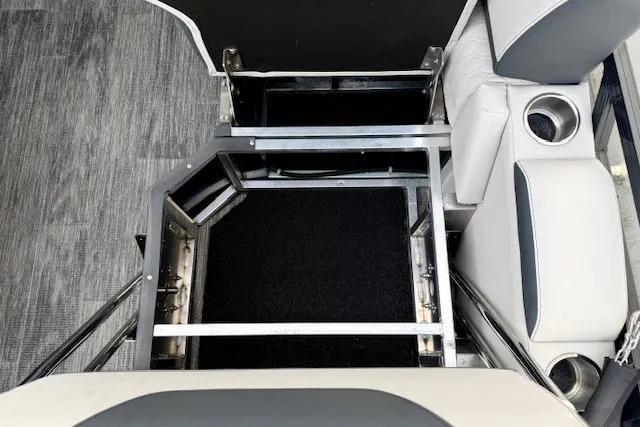 Slide: The Image of 2026 Avalon LSZ Quad Lounge Shift interior seating with cup holders and storage space. - 4