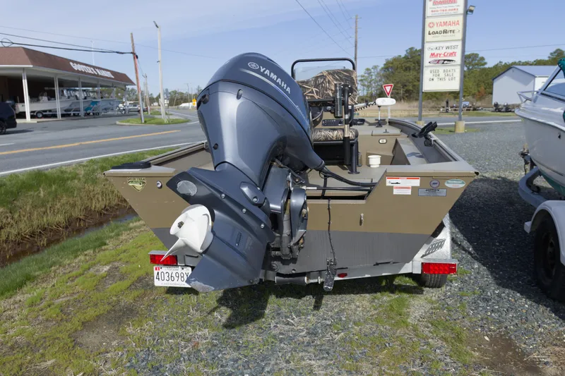 Slide: The Image of 2023 G3 Gator Tough 18 CC boat with Yamaha motor on trailer. - 14