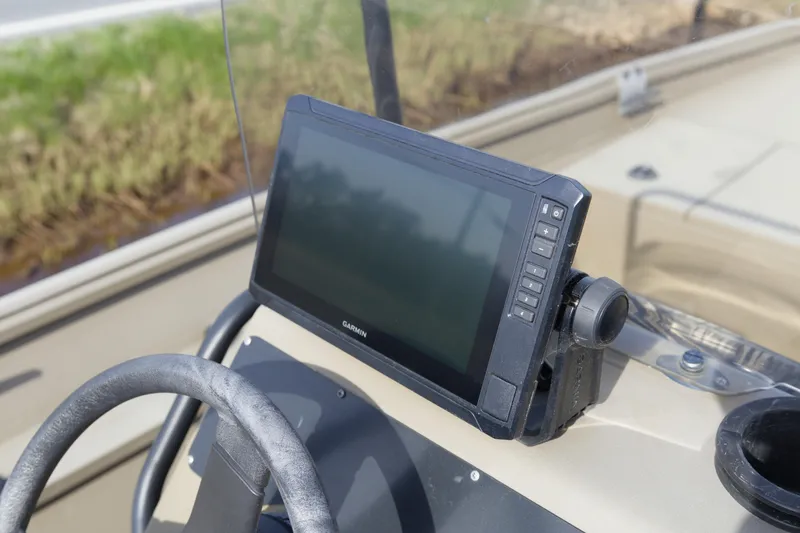 Slide: The Image of Garmin navigation system on 2023 G3 Gator Tough 18 CC boat dashboard. - 8