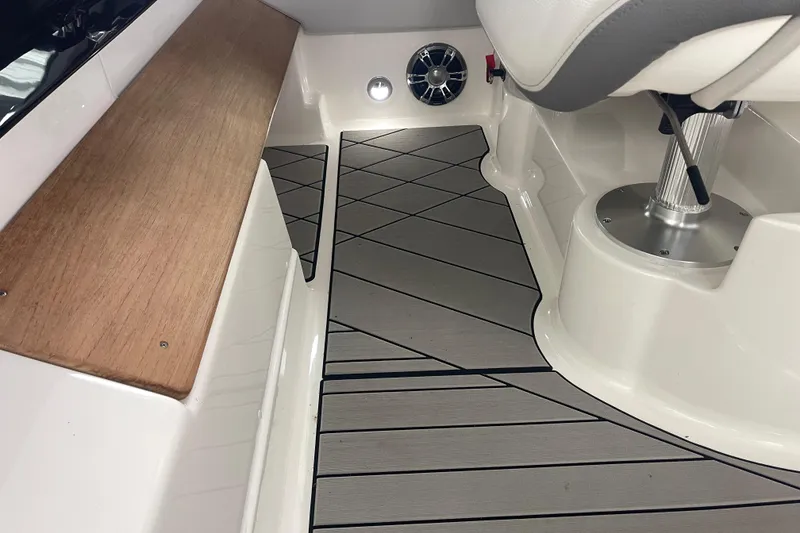 Slide: The Image of 2023 Sea Ray SLX 400 interior with sleek flooring and seating. - 52