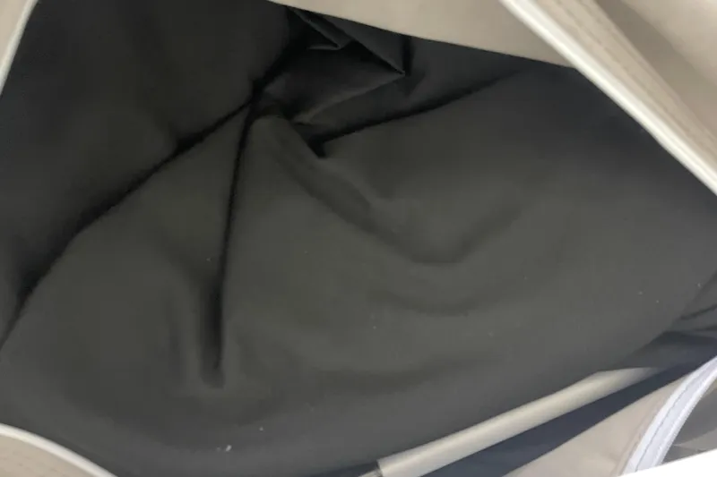 Slide: The Image of Open black interior of a bag, showcasing spaciousness and fabric texture. - 65