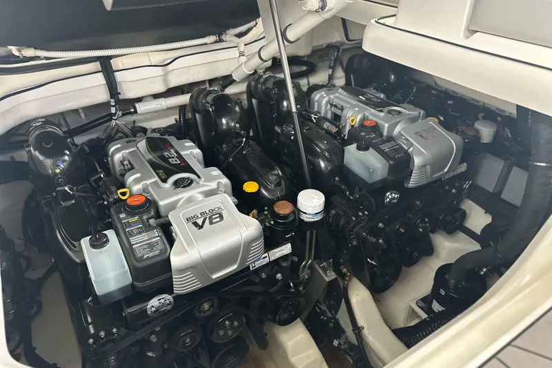 Slide: The Image of Engine compartment of 2023 Sea Ray SLX 400 with dual V8 engines. - 69