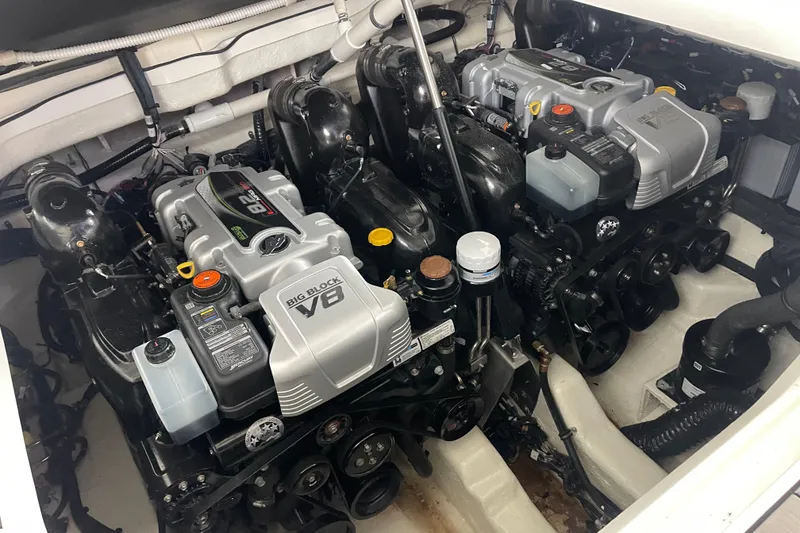 Slide: The Image of Engine compartment of 2023 Sea Ray SLX 400 with dual Big Block V8 engines. - 77