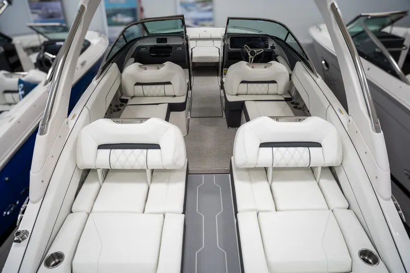 Slide: The Image of Interior of 2026 Regal LS4 boat with luxurious white seating. - 14