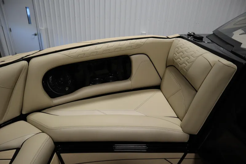 Slide: The Image of 2024 Centurion Ri230 interior with beige leather seating and stylish stitching. - 11