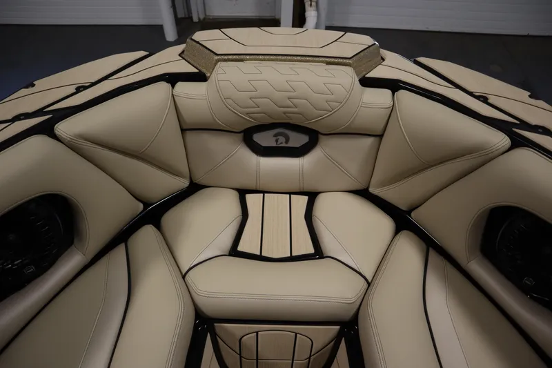 Slide: The Image of 2024 Centurion Ri230 interior storage compartment with beige upholstery and black accents. - 15