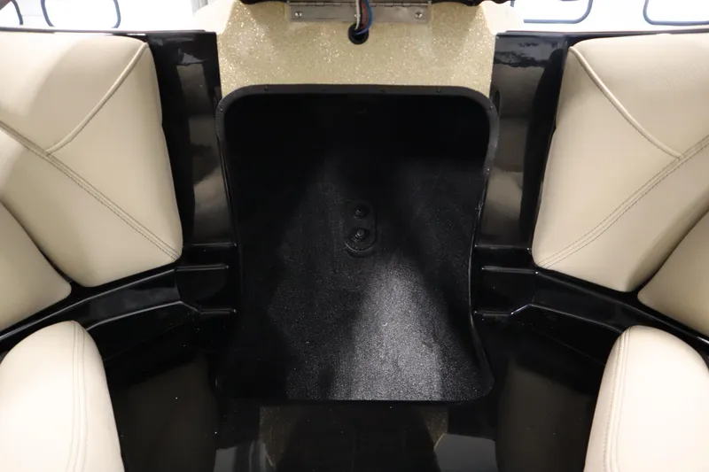 Slide: The Image of Luxurious interior of 2024 Centurion Ri230 boat with beige upholstery and sleek design. - 16