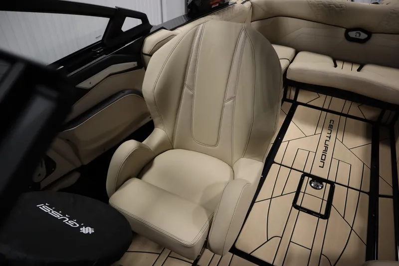 Slide: The Image of Control panel of 2024 Centurion Ri230 boat with audio system buttons. - 33