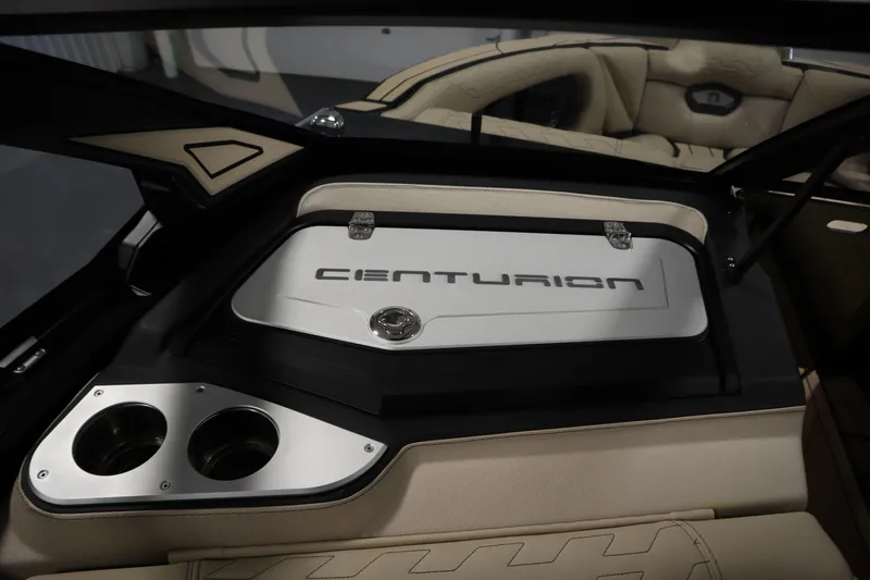 Slide: The Image of 2024 Centurion Ri230 capacity label: 14 persons or 2100 lbs, safety warnings included. - 39