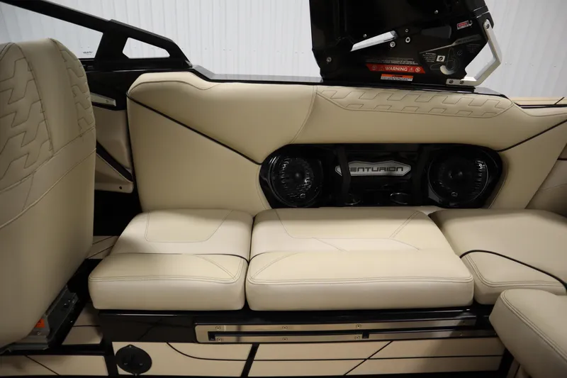 Slide: The Image of 2024 Centurion Ri230 storage compartment with sleek black interior and beige accents. - 47