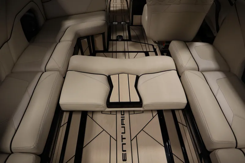 Slide: The Image of 2024 Centurion Ri230 interior with beige seating and integrated speakers. - 50