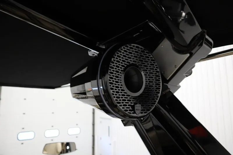 Slide: The Image of 2024 Centurion Ri230 boat speaker system, sleek black design. - 61