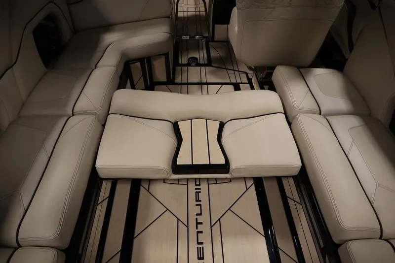 Slide: The Image of 2024 Centurion Ri230 interior with luxurious beige seating and sleek design. - 62