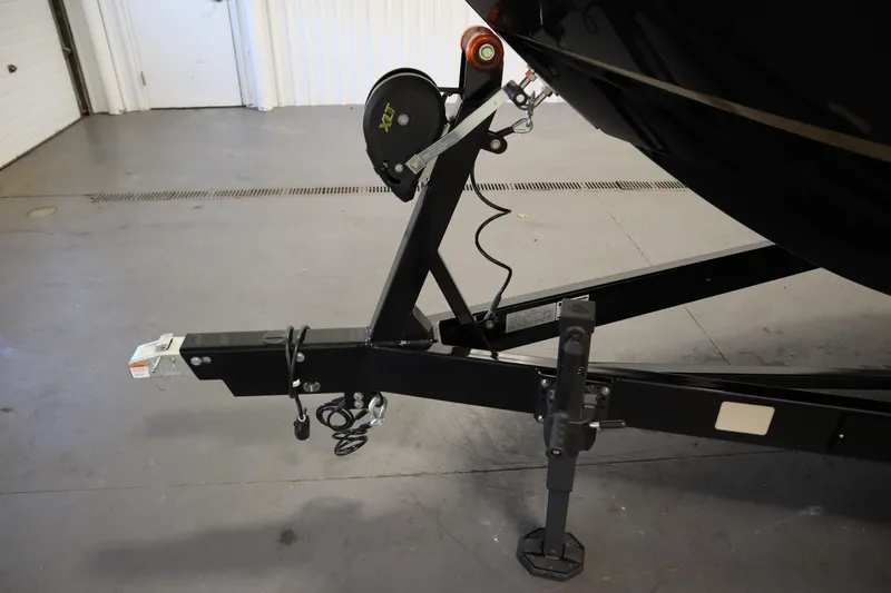 Slide: The Image of 2024 Centurion Ri230 boat rear view with custom deck design. - 75