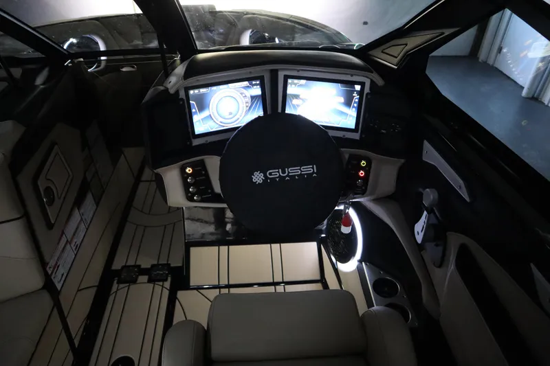 Slide: The Image of 2024 Centurion Ri230 interior with illuminated speaker and cup holders. - 90