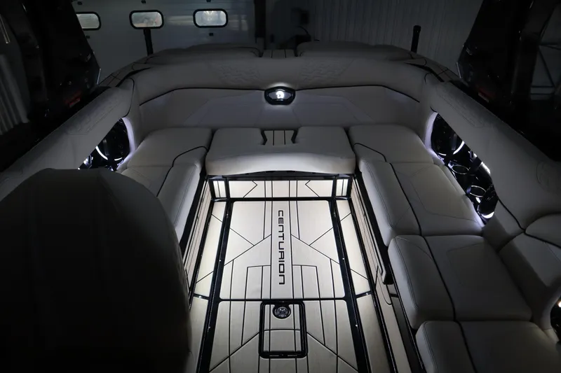 Slide: The Image of 2024 Centurion Ri230 interior with luxurious seating and ambient lighting. - 93